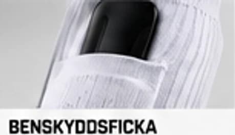 Närbild på den integrerade benskyddsfickan